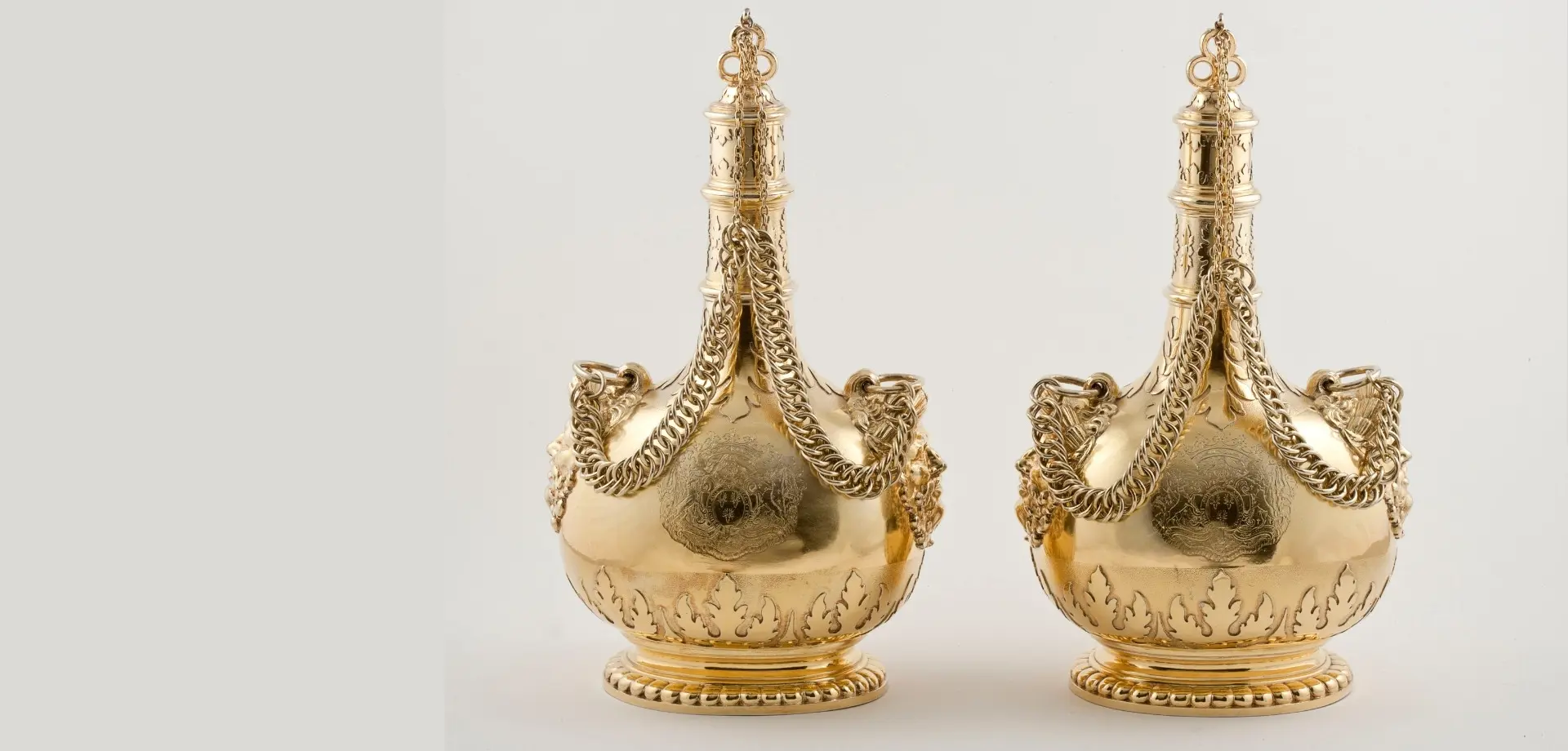 A pair of Dutch silver-gilt pilgrim bottles